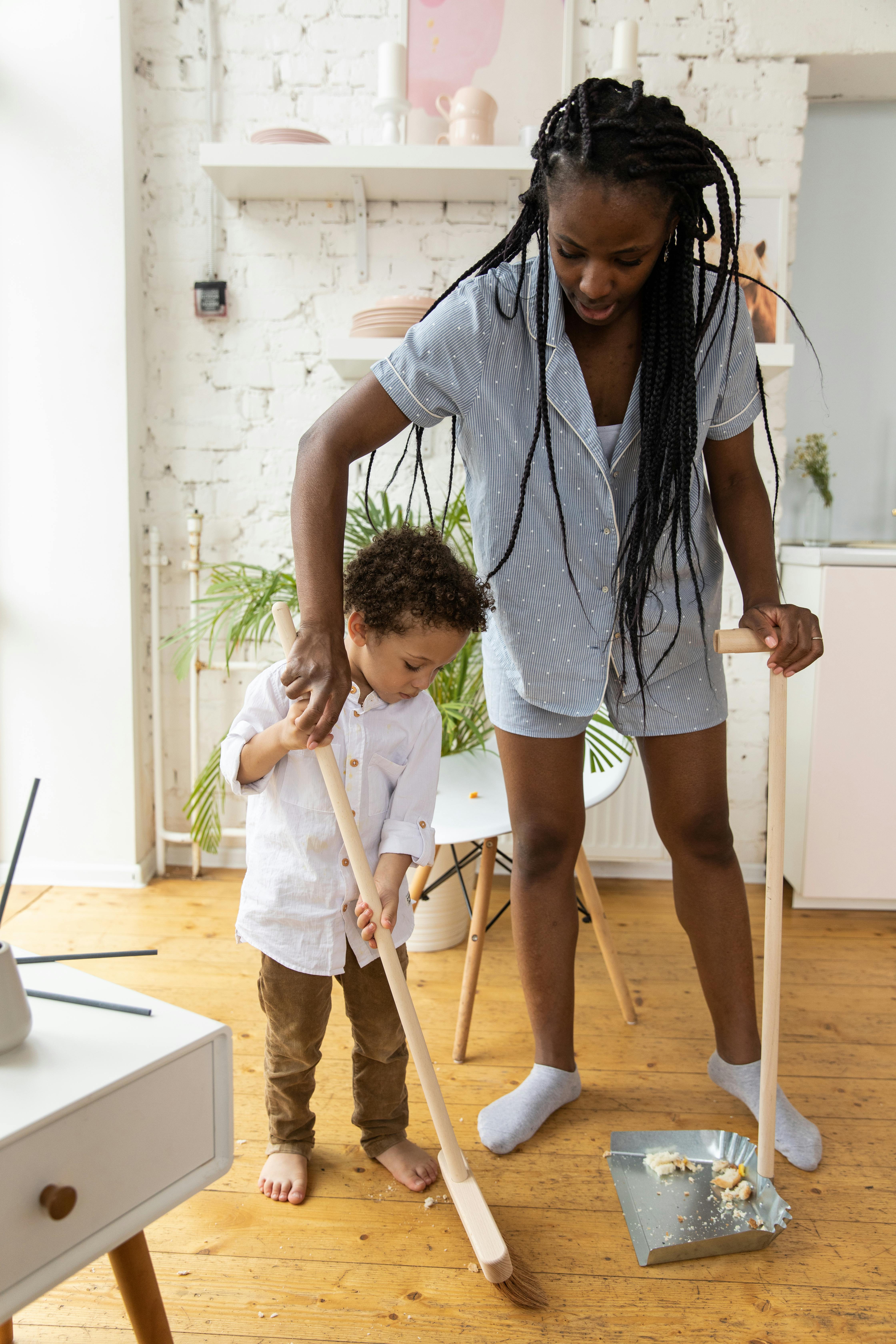 Parent calmly introducing a simple chore routine at home